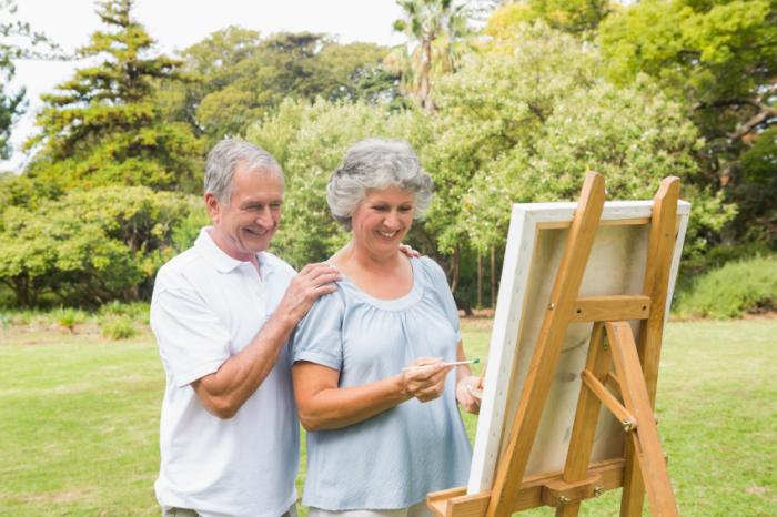 A husband admiring his wife's painting