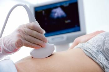 Ultrasound scan on stomach.