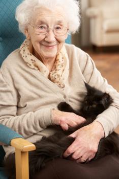 Older lady with pet cat