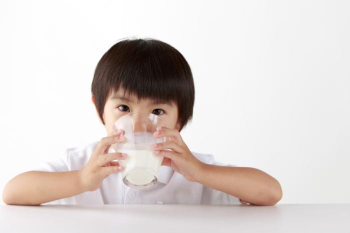 [Child drinking milk]