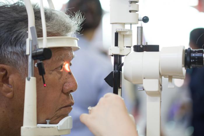 older man having an eye test