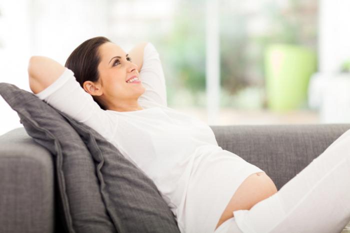 [Pregnant woman relaxing]