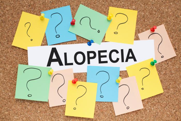 [Alopecia sign with question marks]