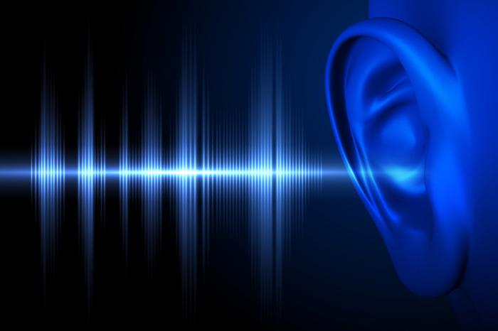 [Blue ear with sound wave illustration]