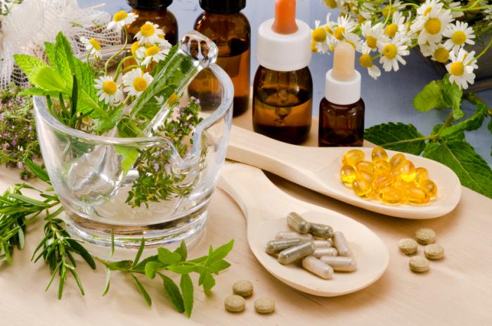 A selection of natural remedies including plants, oils and pills