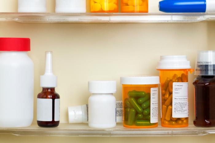 Different pills and medicines on a shelf